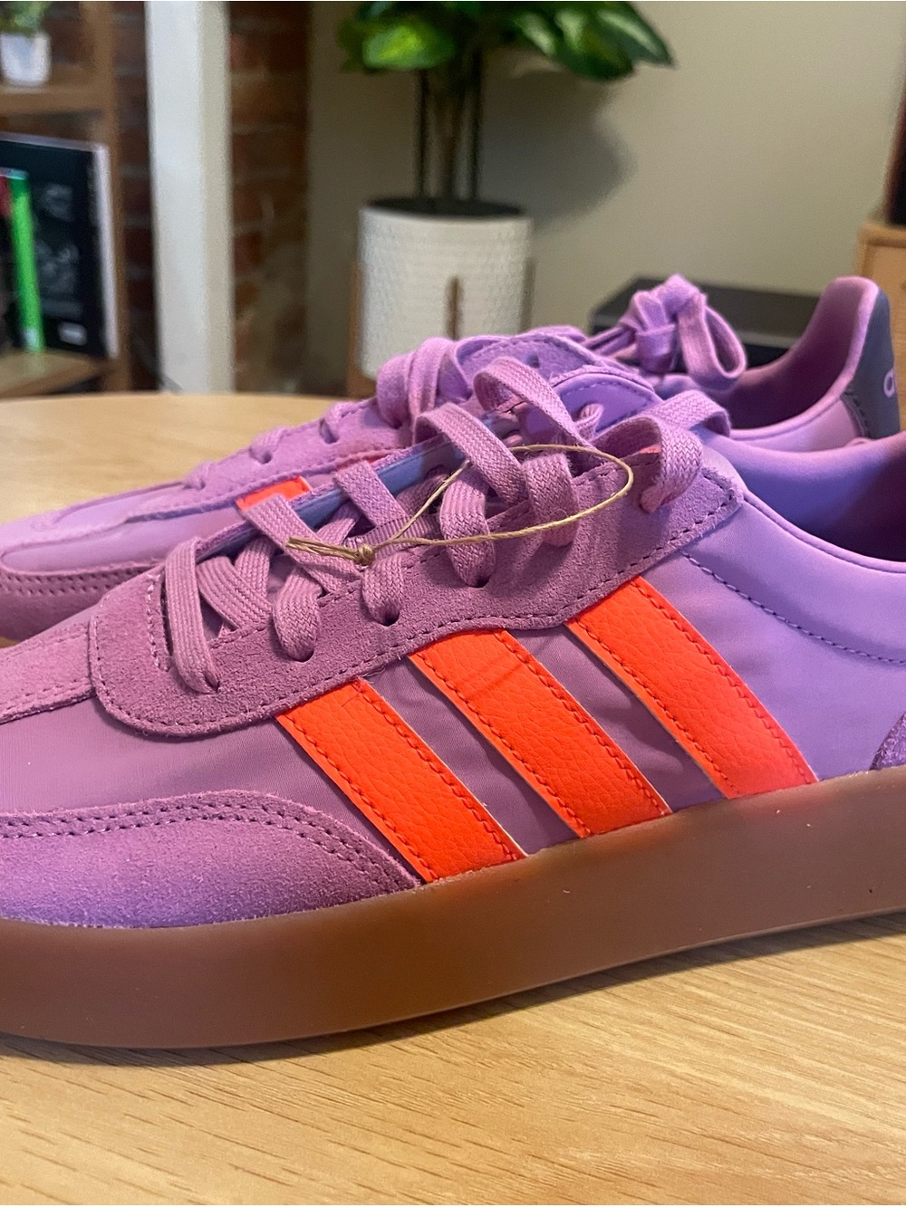Women’s Adidas Purple Sneakers with Orange Stripes